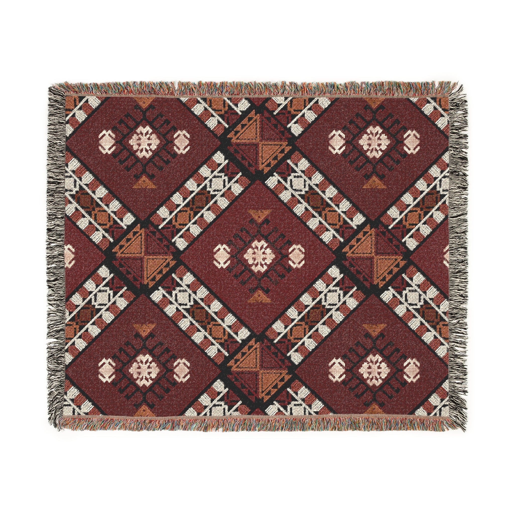 Woven blanket with geometric pattern on a white background

