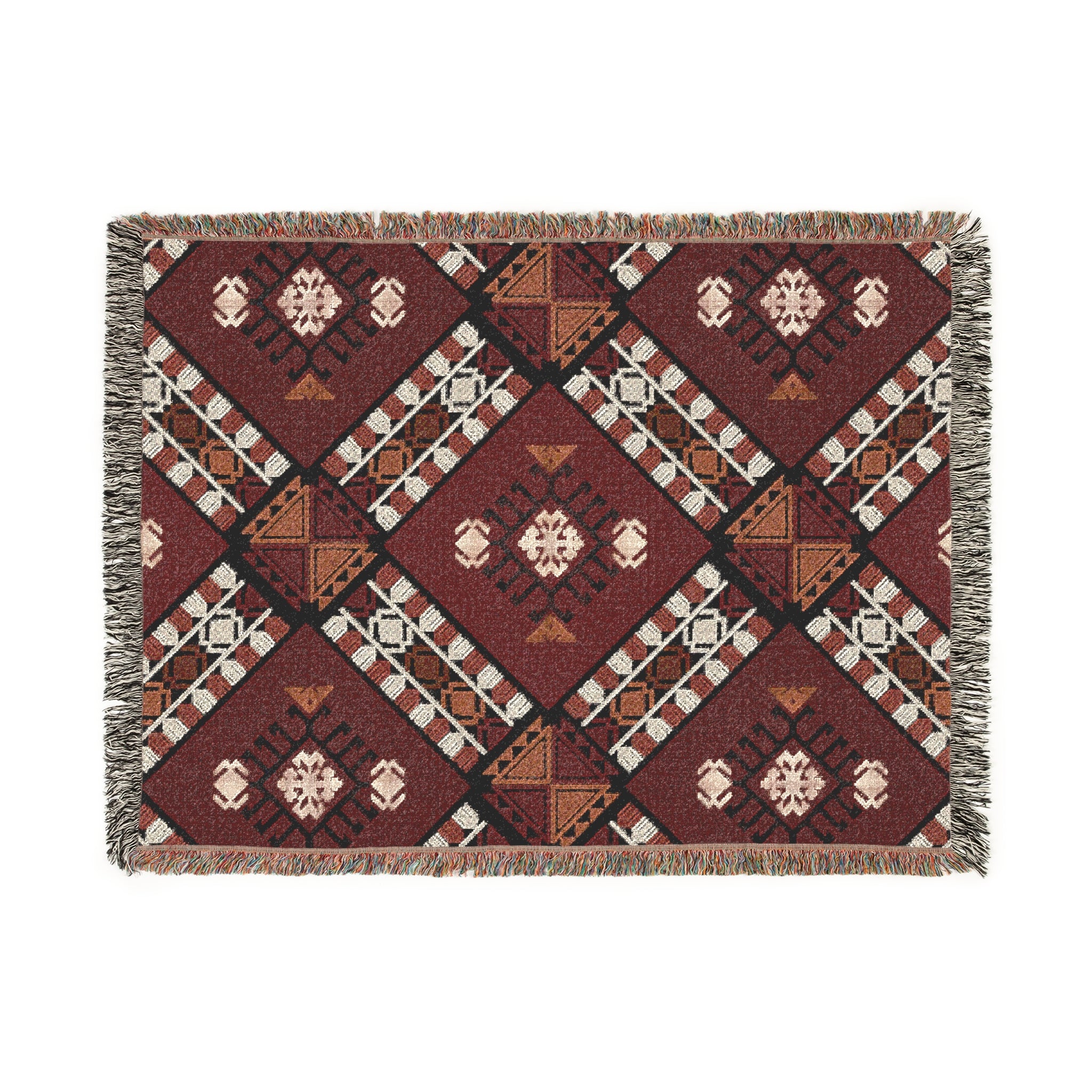 Woven blanket with geometric pattern on a white background